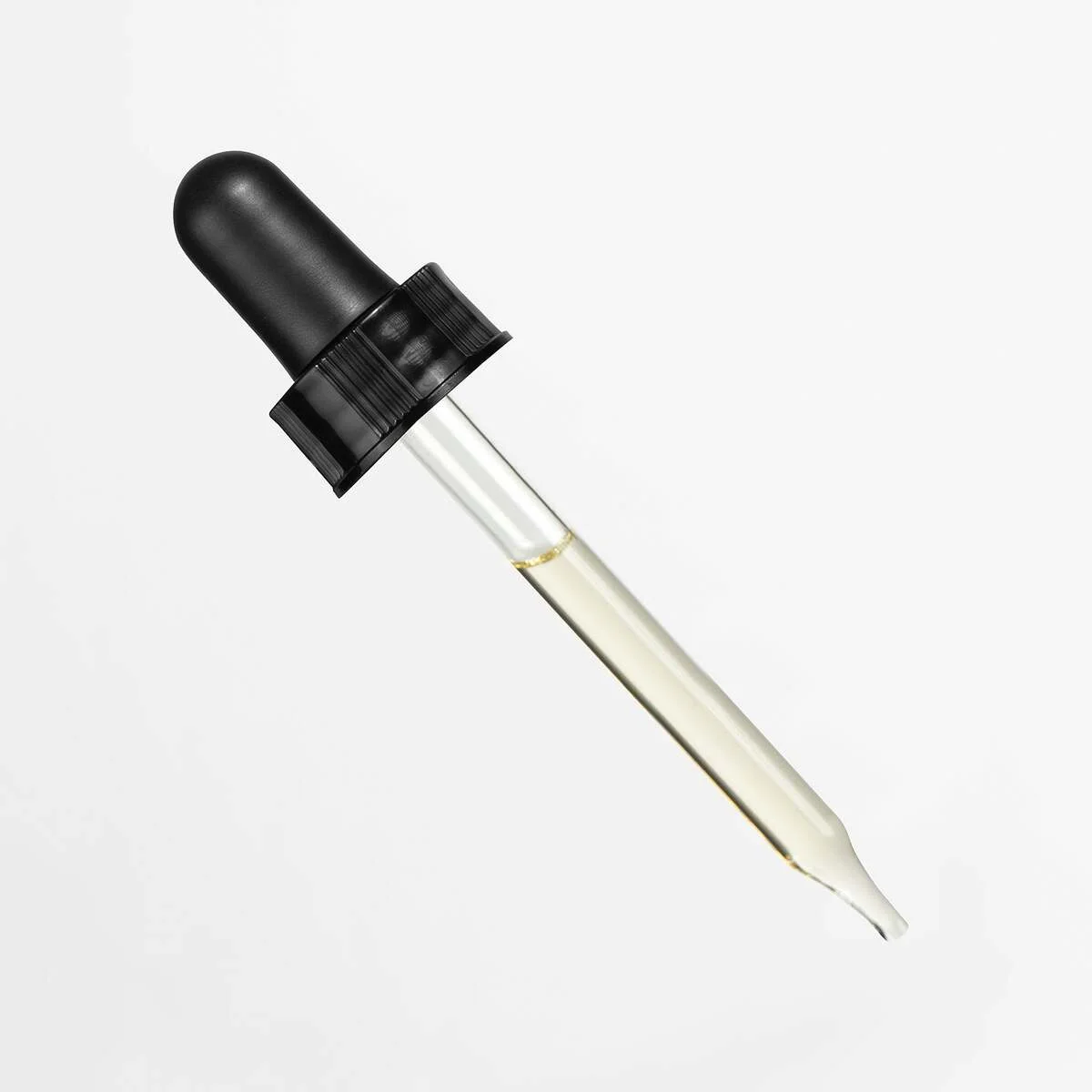 Open bottle of Nourishing Jojoba Face Oil
